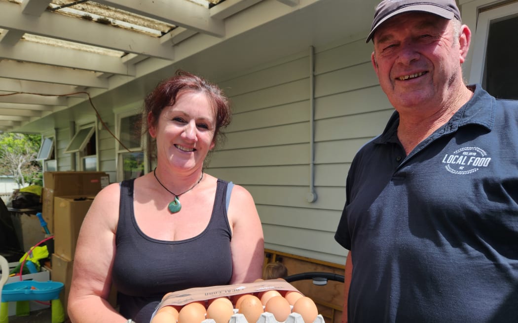 Craig delivers the eggs to the door and enjoys having a yarn with his customers