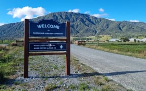 A sign which welcomes people to Gloriavale Christian Community.