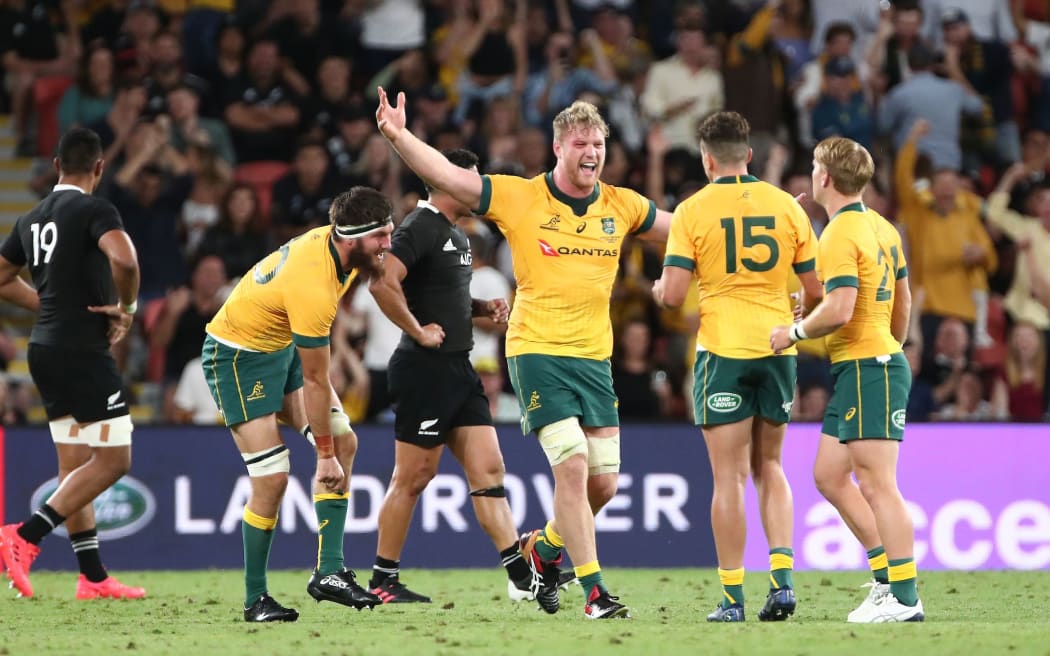 Wallaby players celebrate their win.