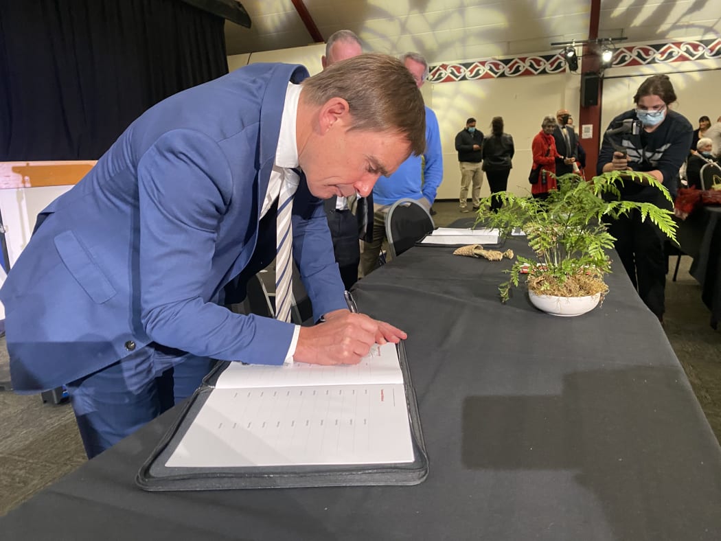 Wellington mayor Andy Foster signing the Tākai Here partnership with mana whenua.