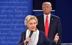 Hillary Clinton and Donald Trump on stage during the second debate of the presidential campaign, St. Louis, Missouri, 9 October 2016.