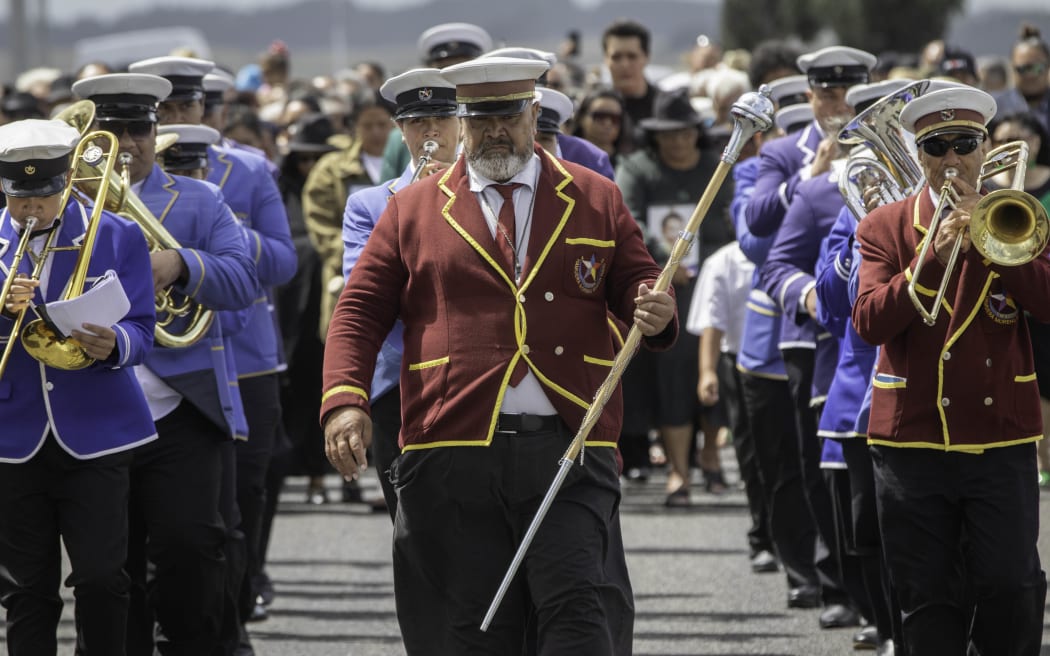 Ngāti Tuwharetoa arrive escorted by a marching band on the first day of Rātana 2024