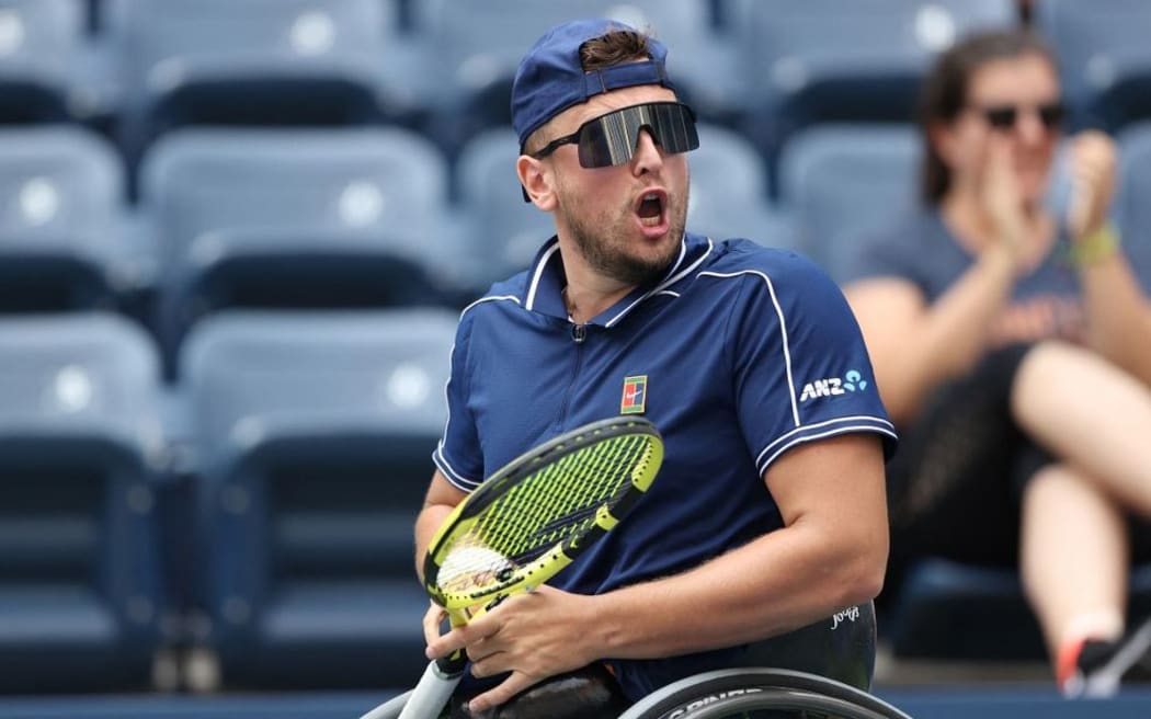 Dylan Alcott of Australia celebrates winning the first set against Niels Vink of the Netherlands during their Wheelchair Quad Singles final match on f the 2021 US Open at the USTA Billie Jean King National Tennis Center on September 12, 2021 in New York City.