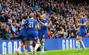 Chelsea celebrate a goal in the WSL.