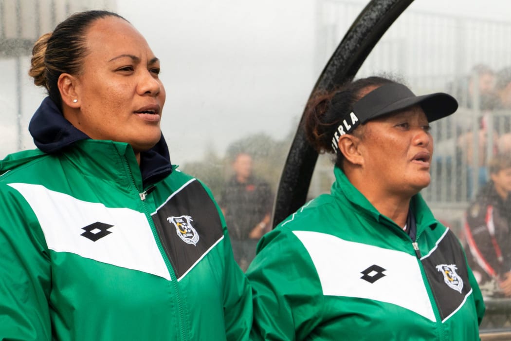 Tupou Patia-Brogan (left) singing the Cook Islands anthem ahead of a Under 16s girls match in Auckland.