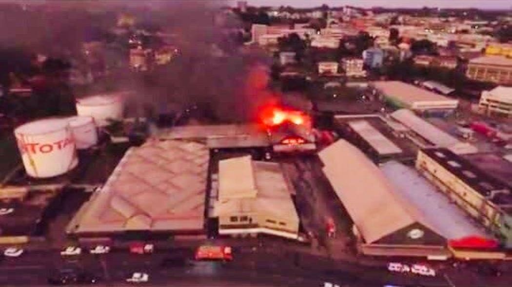 Value City and flea market in flames