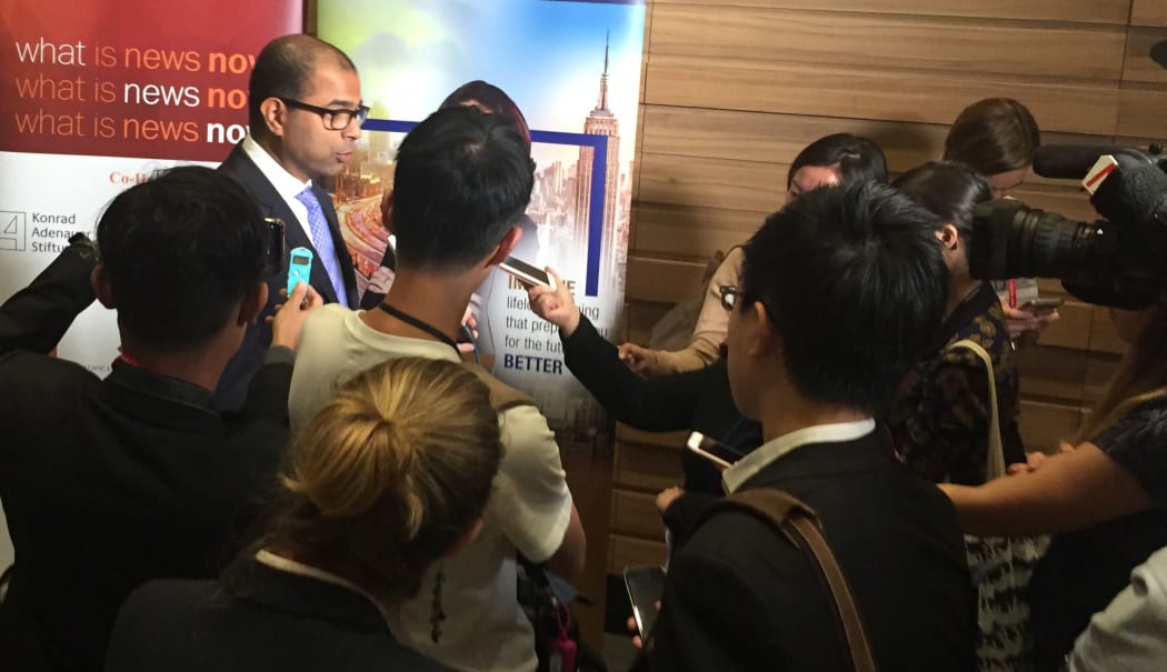 Singapore government communications minister Dr Janil Puthucheary faces the press on the proposed law to fight fake news.