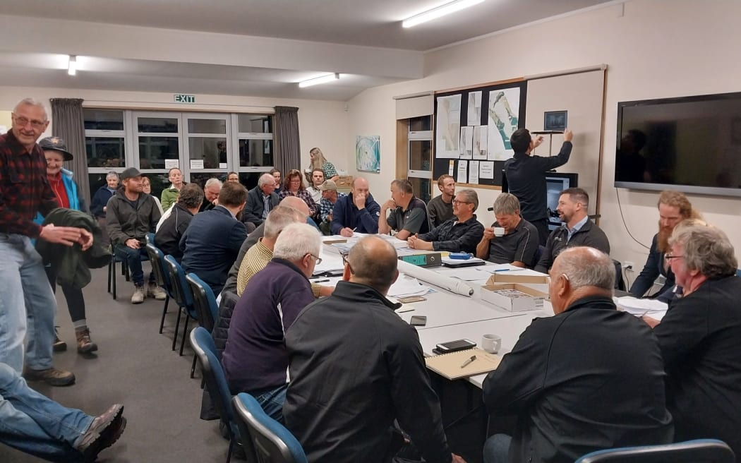 Members of the Franz Josef Joint Rating District, council representatives, and local residents arrive for Monday's meeting.