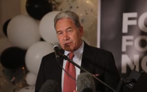 New Zealand First leader Winston Peters speaking to supporters at the party's headquarters at Russell.