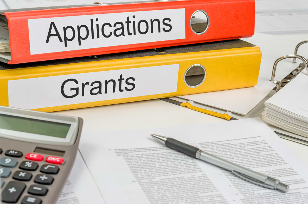 Folders with the label Applications and Grants.