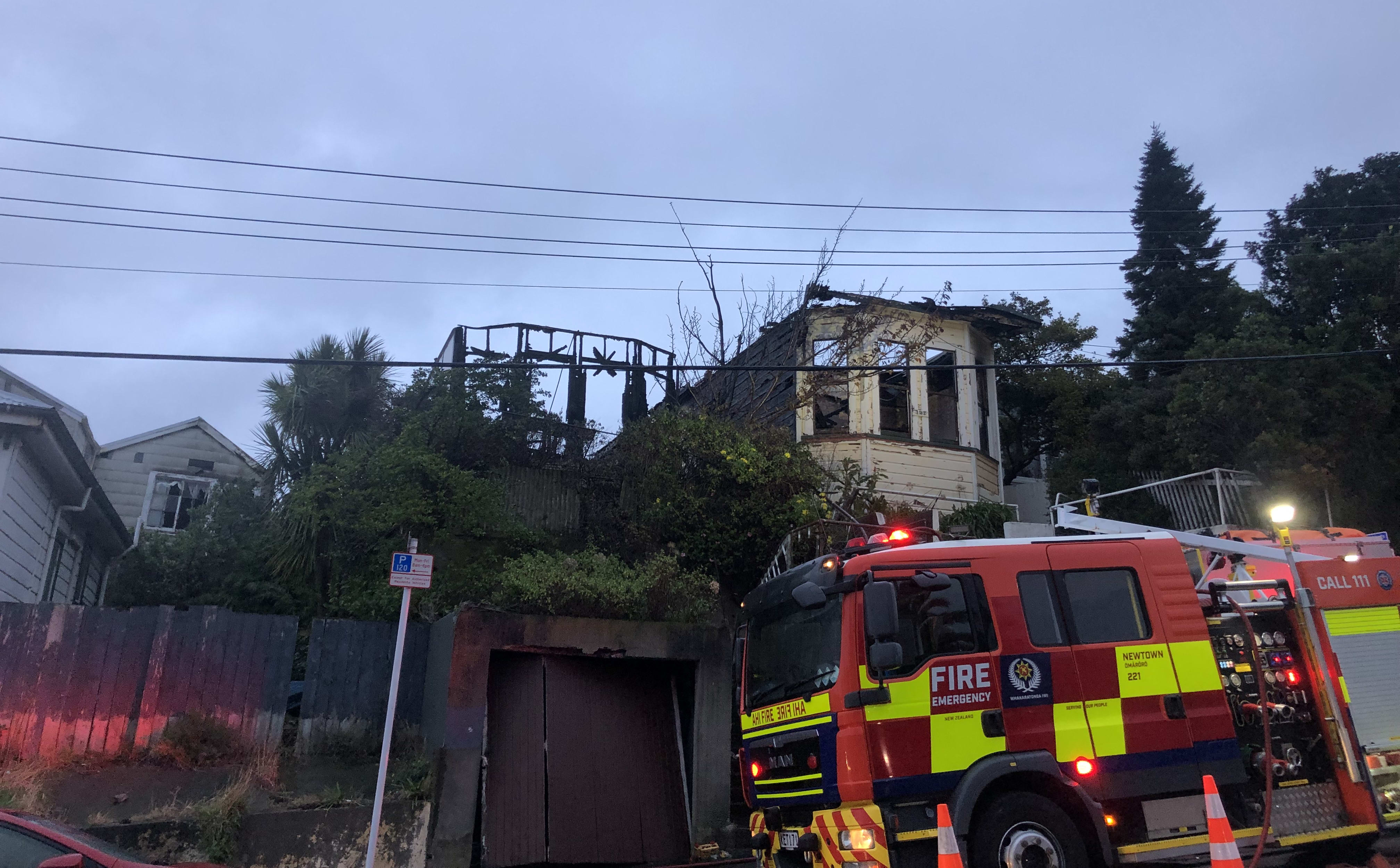 A fire truck outside a house on Hanson St, Newtown, gutted by fire.