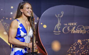 Dame Lisa Carrington accepts the ANOC Outstanding Sporting Career Award.