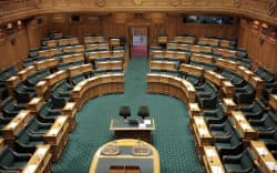 Seats in the empty debating chamber at Parliament
