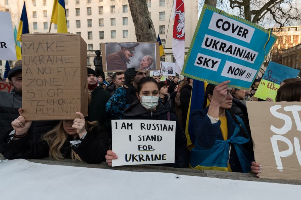 Ukrainian people and their supporters demonstrate outside Downing Street calling for the West to implement strong sanctions against Russia.