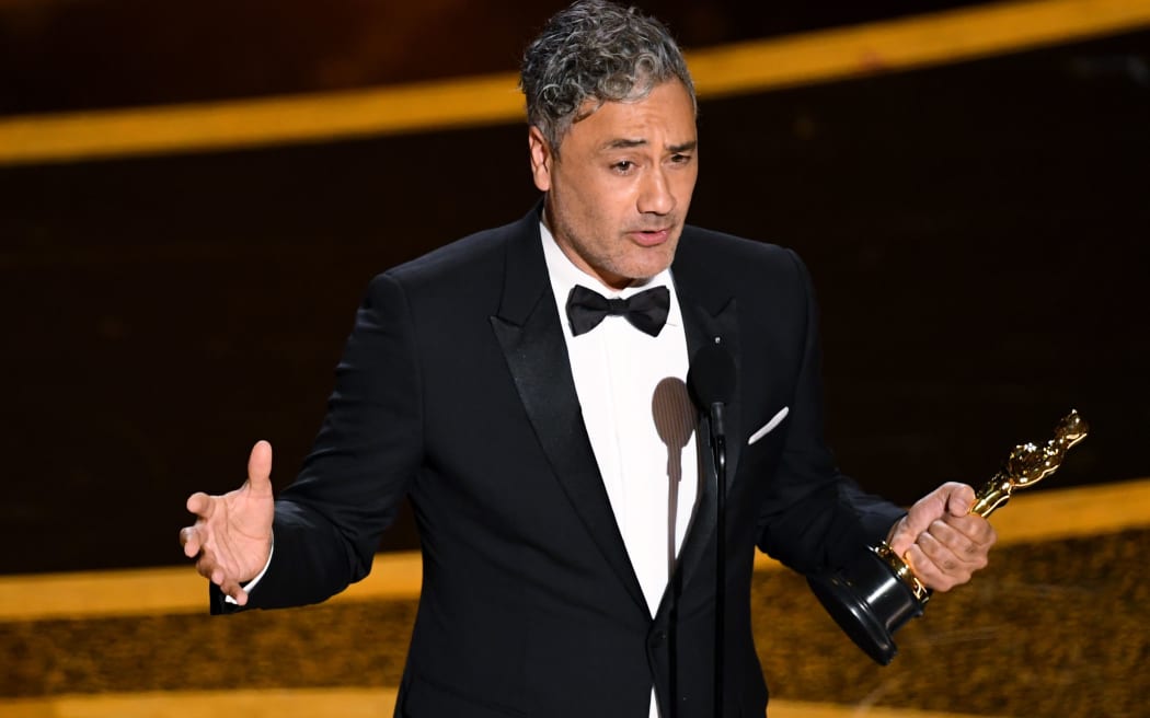 HOLLYWOOD, CALIFORNIA - FEBRUARY 09: Taika Waititi accepts the Writing - Adapted Screenplay - award for 'Jojo Rabbit' onstage during the 92nd Annual Academy Awards at Dolby Theatre on February 09, 2020 in Hollywood, California.   Kevin Winter/Getty Images/AFP