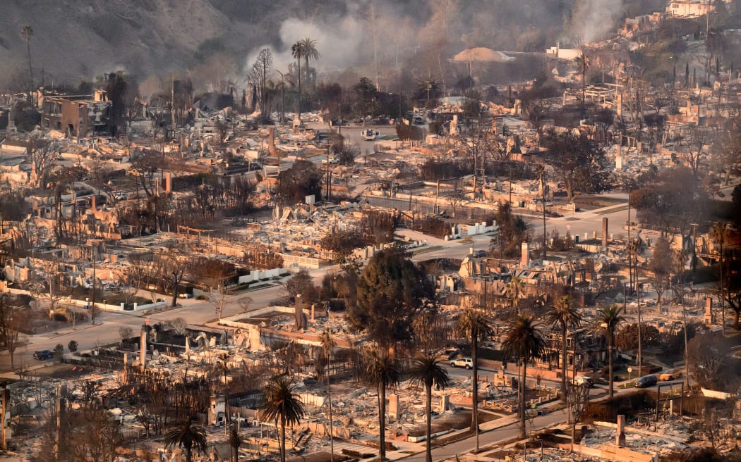 Los Angeles wildfires devour thousands of homes even as fierce winds ease RNZ News
