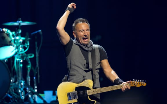 US musician Bruce Springsteen performs with The E Street Band at the AccorHotels Arena in Paris on July 11, 2016. (Photo by BERTRAND GUAY / AFP)