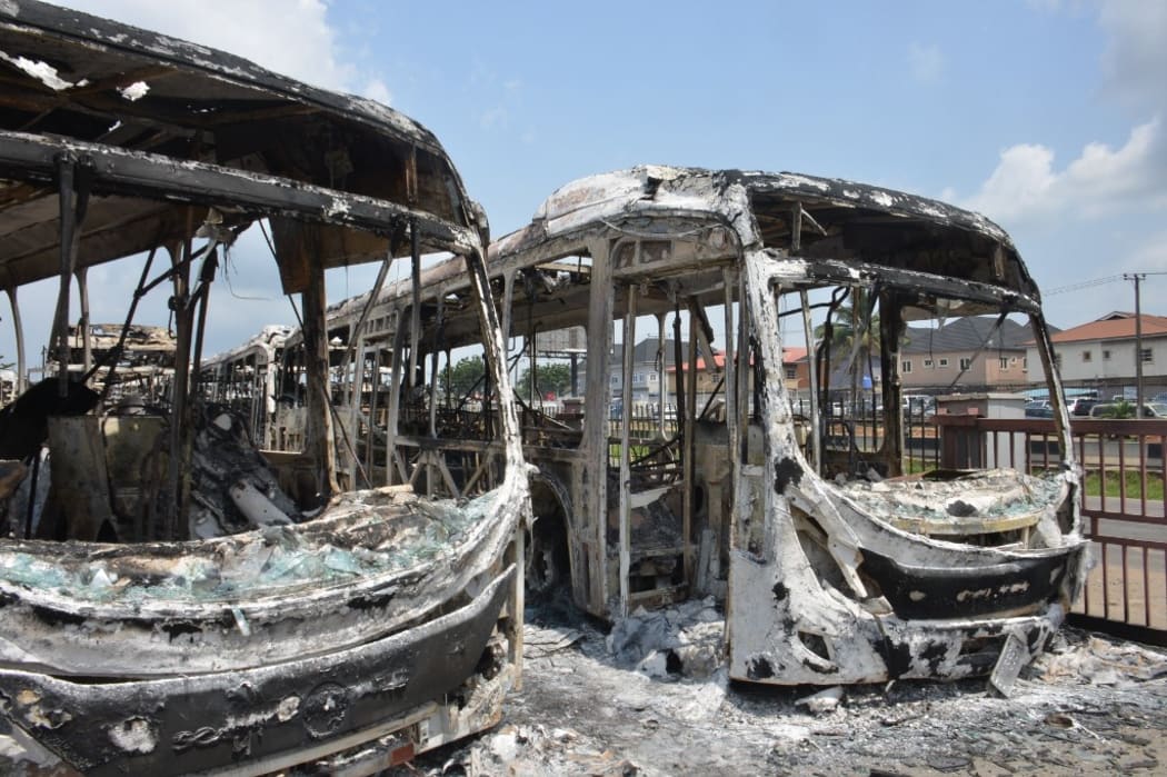 The aftermath of 23 BRT buses and a car set ablaze at Ojodu Berger terminal, along Lagos-Ibadan Expressway in Lagos on October 23, 2020.