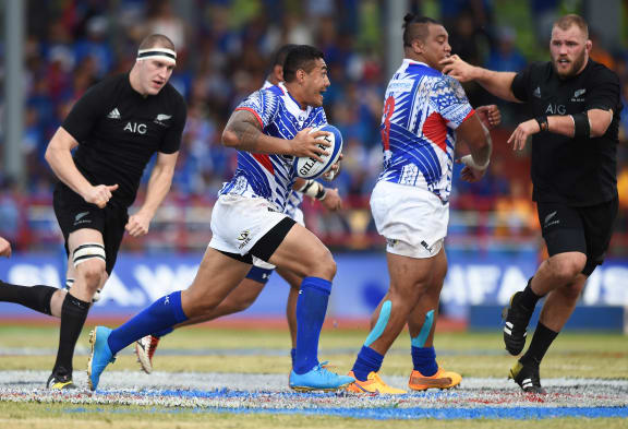 Tusi Pisi and Census Johnston playing for Samoa against the All Blacks in 2015.