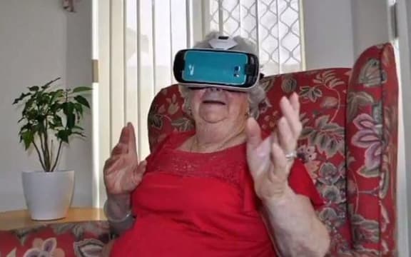 senior with VR headset on