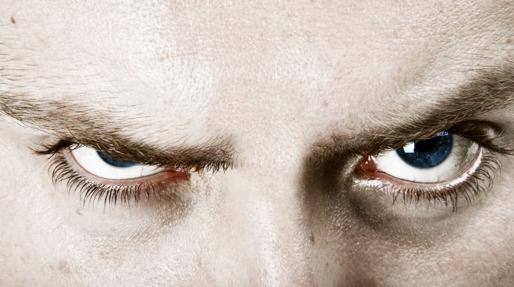 angry man eyes close-up