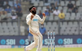 Ajaz Patel of New Zealand celebrates a wicket during the second test against India at the Wankhede Stadium in Mumbai, 2021.