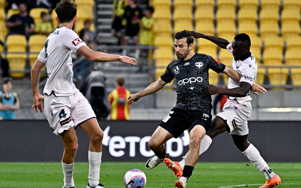 Kosta Barbarouses in action for the Wellington Phoenix against Melbourne Victory in Wellington.