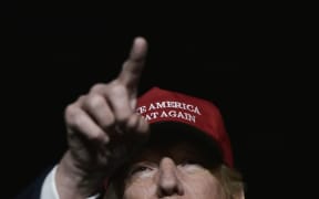US Republican presidential nominee Donald Trump addresses a campaign rally at Atlantic Aviation in Moon Township, Pennsylvania on November 6, 2016. AFP / MANDEL NGAN