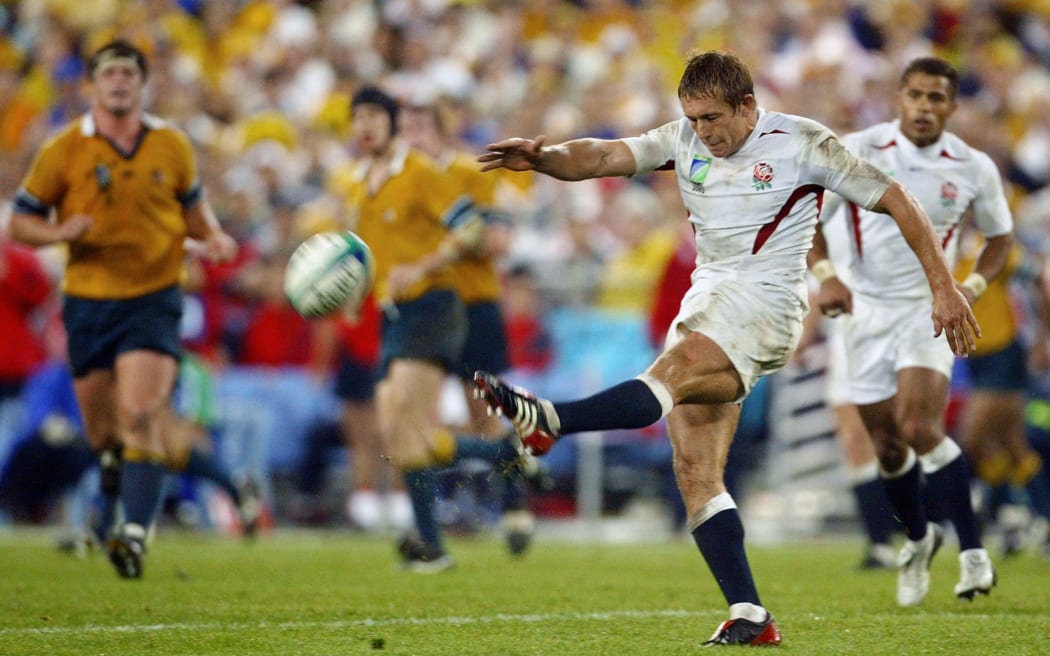 English fly-half Jonny Wilkinson kicks the winning Rugby World Cup goal, November 2003.