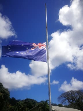 Cook Islands flags flying at half-mast