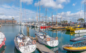 AUCKLAND, NEW ZEALAND, FEBRUARY 19, 2020: Boats mooring at Viaduct basin in Auckland New Zealand