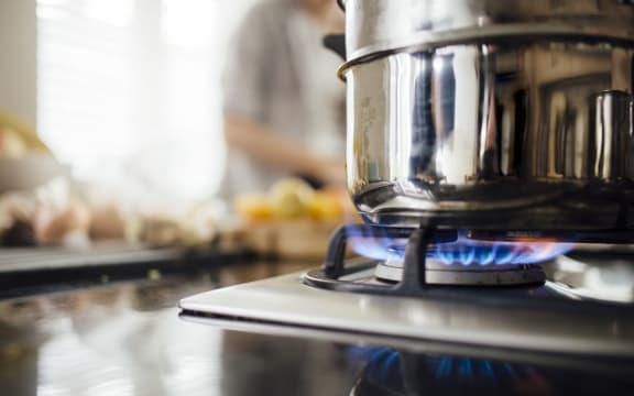 Vegetable steamer on a gas hob.