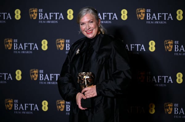 New Zealand costume designer Kate Hawley poses with the award for Best costume design for "Frankenstein" during the BAFTA British Academy Film Awards ceremony at the Royal Festival Hall, Southbank Centre, in London, on February 22, 2026.