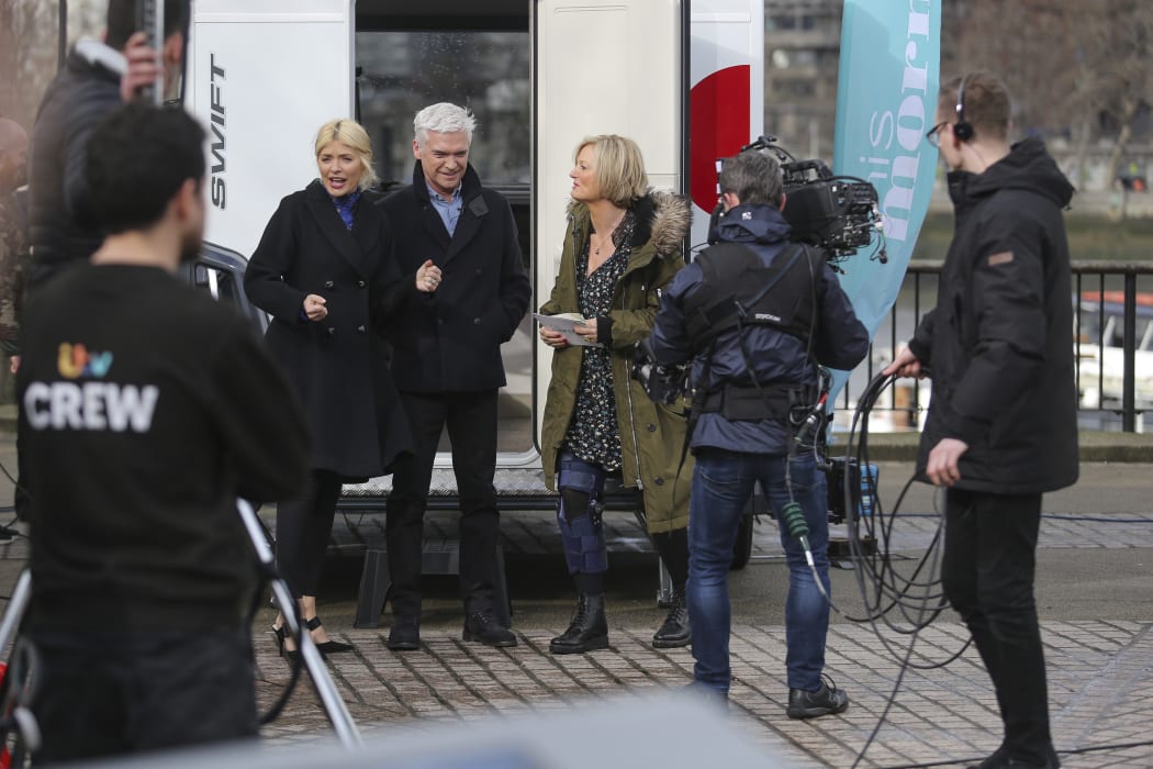 Phillip Schofield and co-host Holly Willoughby, filming ITV's This Morning.
