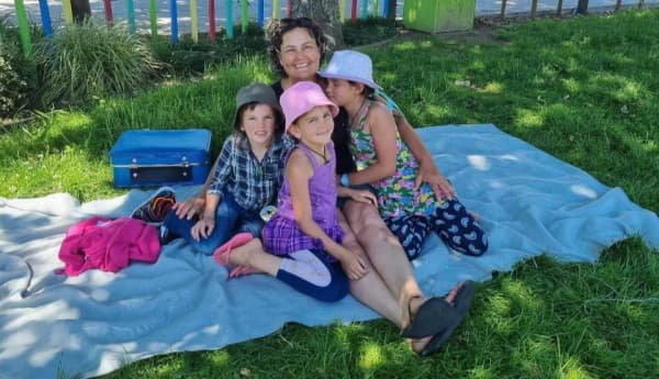 A photo posted on social media by Cat of her and her three missing children during a visit to the park in November 2021 before they were taken by their father, Tom Phillips.