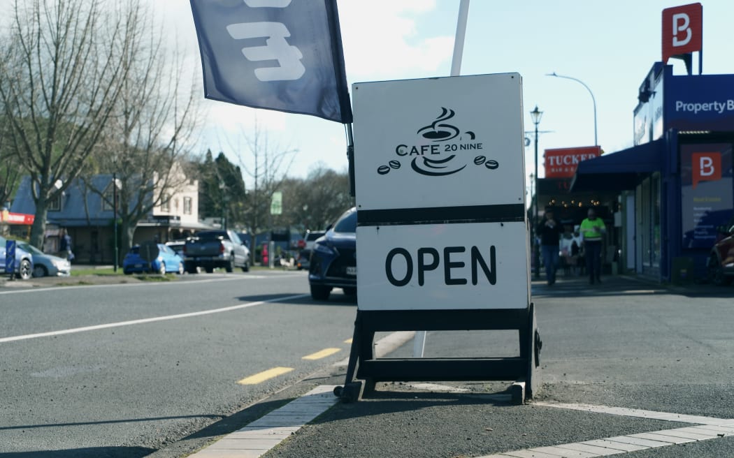 A sign for Cafe 20 Nine, which lies near the centre of the small Waikato town of Tīrau.