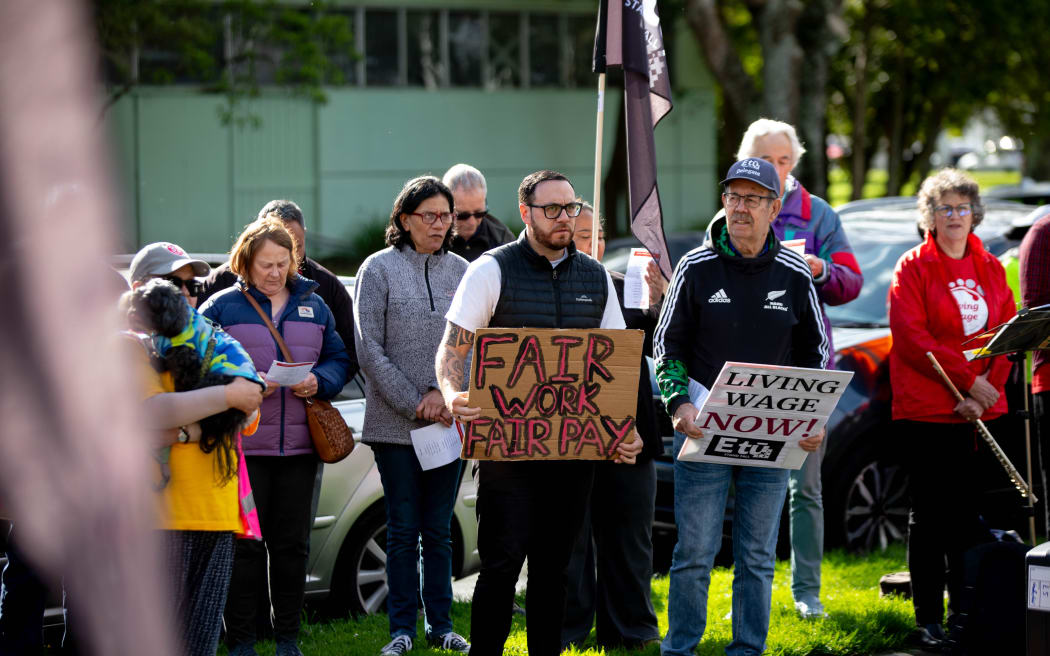 About 200 people have gathered outside Resene's head office in Lower Hutt to protest for a living wage.