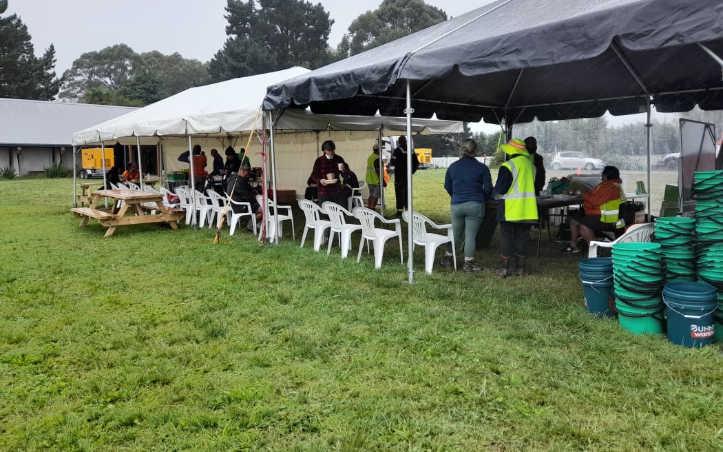 Hundreds are turning up at Waiohiki marae to help locals clean up after Cyclone Gabrielle.