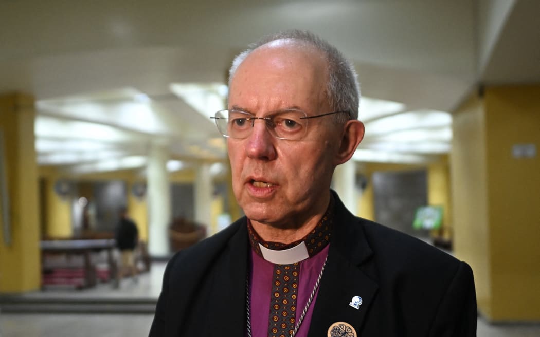 Archbishop of Canterbury Justin Welby speaks during a visit to the tomb of Oscar Arnulfo Romero in San Salvador on June 4, 2024. - The leader of the Anglican Church and Archbishop of Canterbury, Justin Welby, said Tuesday that the assassinated Salvadoran Archbishop Oscar Arnulfo Romero, canonized in 2018, is an inspiration to fight against injustice after visiting his tomb in San Salvador. (Photo by Marvin RECINOS / AFP)