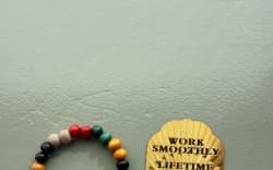 Auckland resident Julia Bainbridge says a man wearing monk-style robes gave her a gold blessing card and bracelets before asking for a donation.