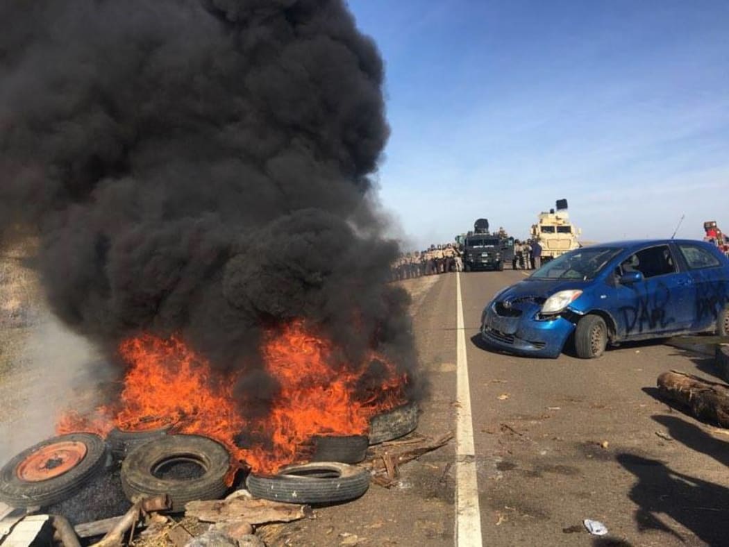 Tires were set alight during the protest against the controversial Dakota Access pipeline.