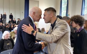 Far North Mayor Moko Tepania (right) and council chief executive Guy Holroyd hongi at the end of the swearing in ceremony