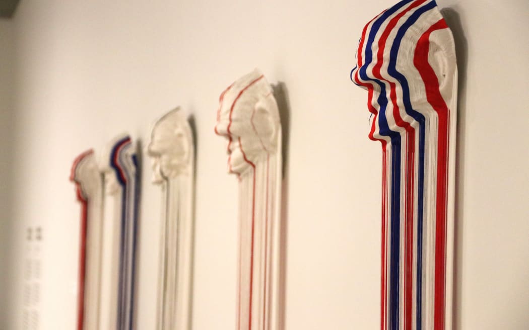 Yuk King Tan Evolutionary Revolutionary 2006, tassels on mask. Courtesy Chartwell Collection, Auckland Art Gallery o Tāmaki,