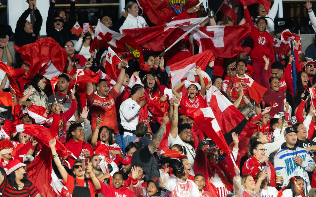 Tongan supporters cheer during the Paciﬁc Championship against the Kiwis at the Mount Smart Stadium on 2 November.