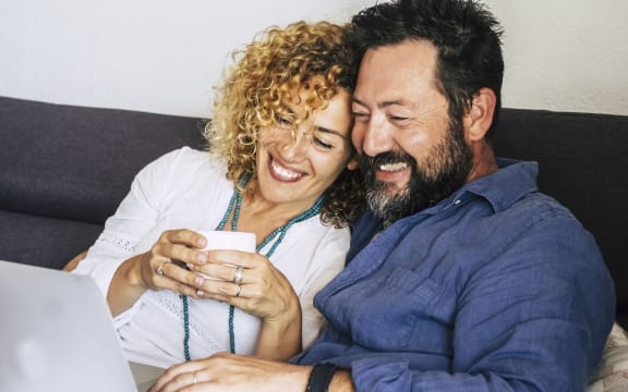 A middle aged couple.