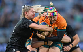 Sharni Williams on attack for Australia during their Rugby World Cup match against the New Zealand Black Ferns.