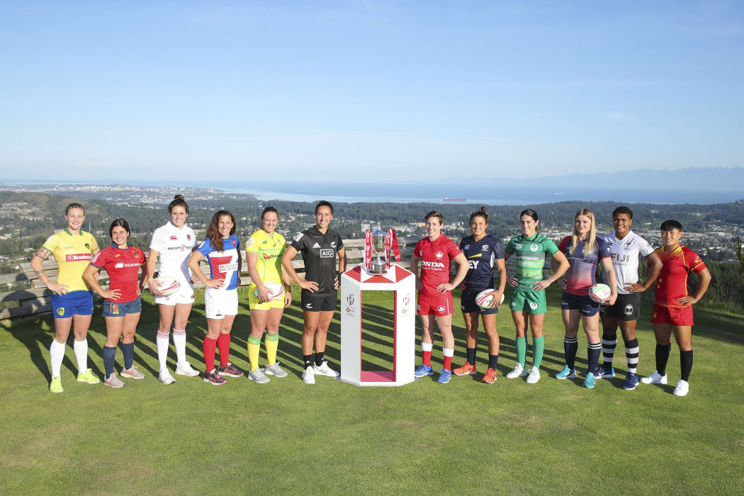 All team captain's pose with the trophy ahead of the Women's World Series event in Langford, Canada, including Fiji's Rusila Nagasau (2R).