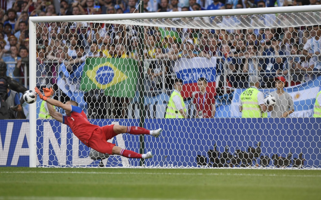 Iceland keeper Hannes Por Halldorsson saves a penalty.
