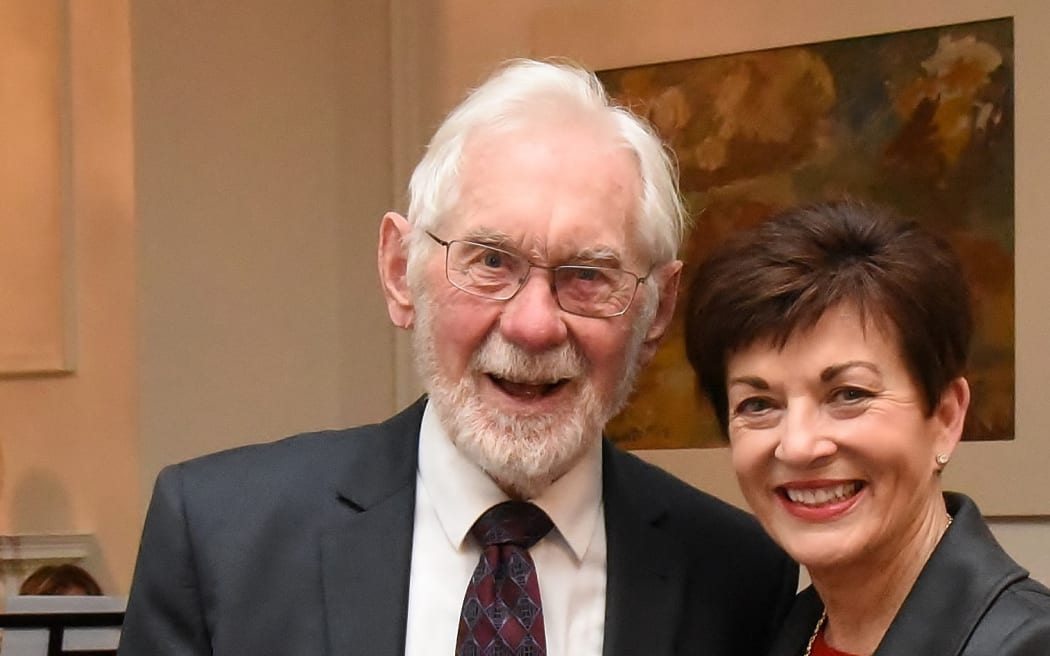 The Hon Russell Marshall (centre) with Dame Patricia Lee Reddy.