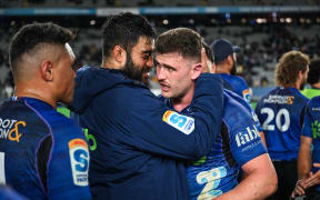 Akira Ioane of the Blues and Dalton Papali'i of the Blues.